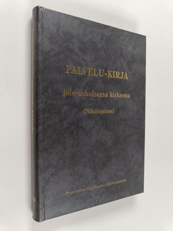 Palvelu-kirja jalo-uskoisessa kirkossa.