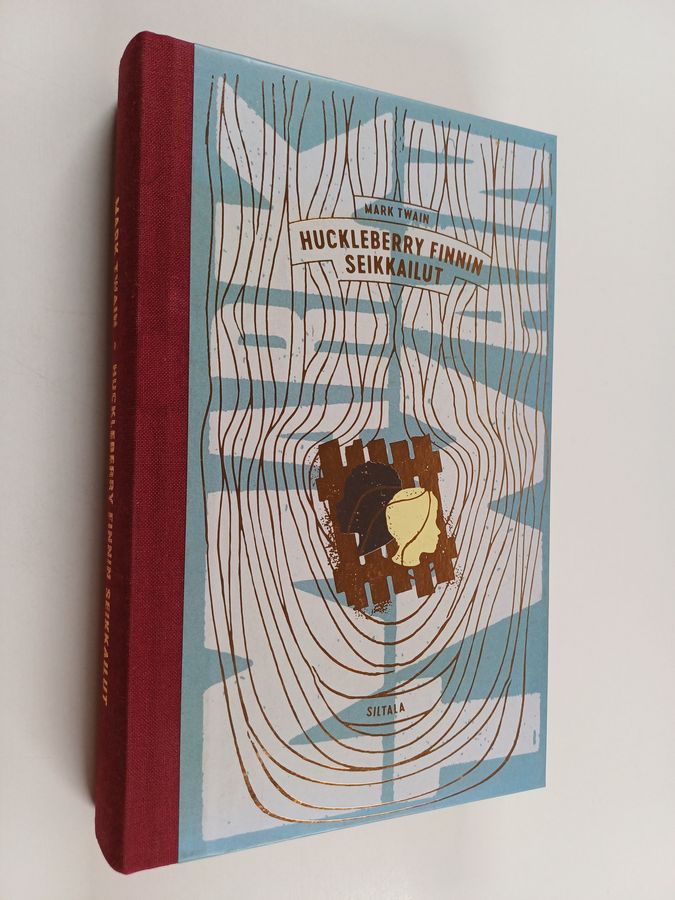 Mark Twain : Huckleberry Finnin seikkailut (uusi suomennos)