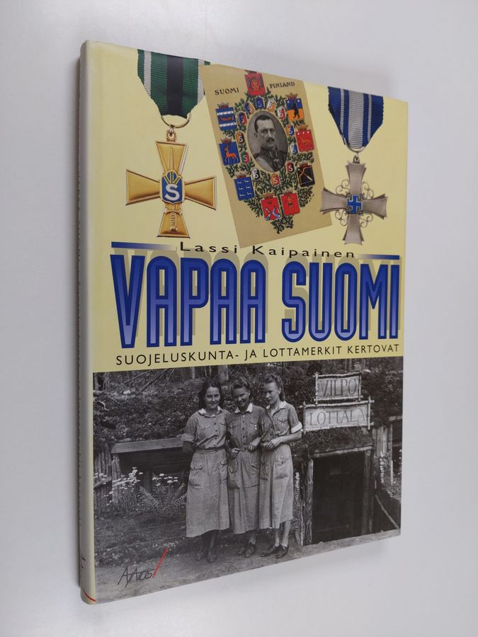 Lassi Kaipainen : Vapaa Suomi : suojeluskunta- ja lottamerkit kertovat