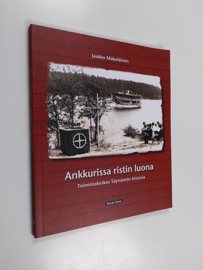 Ankkurissa ristin luona