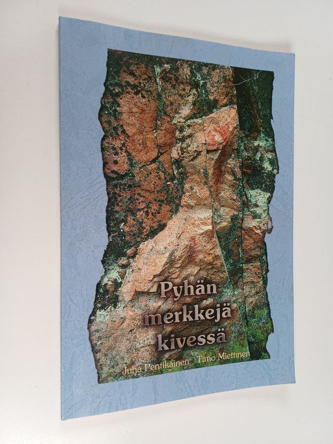 Pyhän merkkejä kivessä