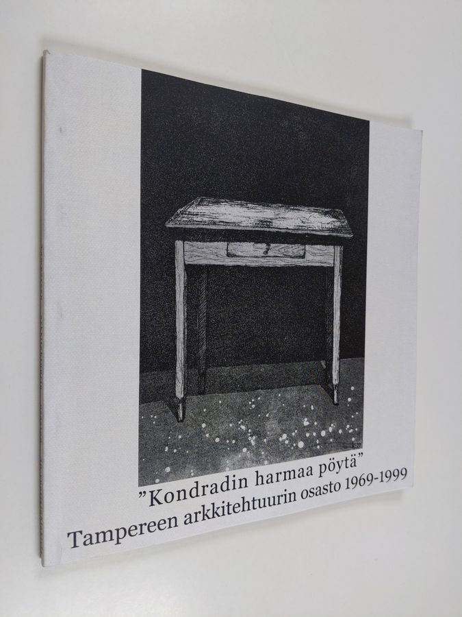 "Kondradin harmaa pöytä"