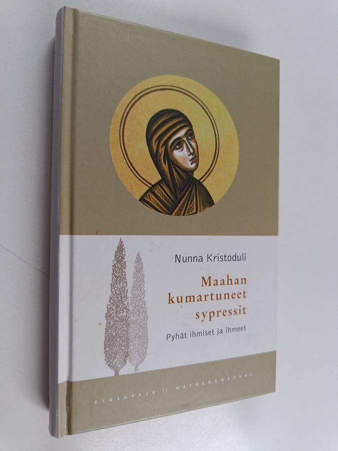 Maahan kumartuneet sypressit