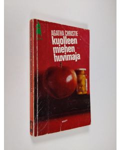 Kirjailijan Agatha Christie käytetty kirja Kuolleen miehen huvimaja