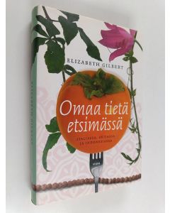 Kirjailijan Elizabeth Gilbert käytetty kirja Omaa tietä etsimässä Italiassa, Intiassa ja Indonesiassa