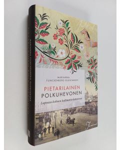Kirjailijan Marianna Flinckenberg-Gluschkoff käytetty kirja Pietarilainen polkuhevonen : lapsuus kolmen kulttuurin katveessa