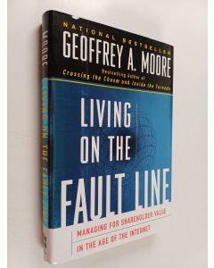 Kirjailijan Geoffrey A. Moore käytetty kirja Living on the Fault Line : managing for shareholder value in the age of the internet