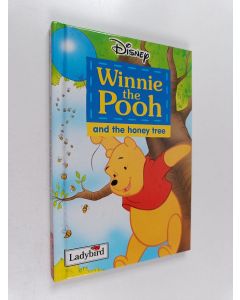Kirjailijan Walt Disney käytetty kirja Winnie the pooh and the honey tree