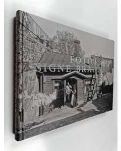 Kirjailijan Jan ym. Alanco käytetty kirja Foto Signe Brander : valokuvia Helsingistä ja helsinkiläisistä vuosilta 1907-1913 = fotografier av Helsingfors och Helsingforsbor 1907-1913