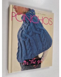 Kirjailijan Trisha Malcolm käytetty kirja Vogue knitting ponchos