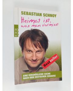 Kirjailijan Sebastian Schnoy käytetty kirja Heimat ist, was man vermisst : eine vergnügliche Suche nach dem deutschen Zuhause
