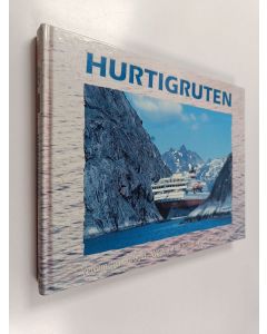 Kirjailijan Bjørn Rasch-Tellefsen käytetty kirja Hurtigruten : velkommen om bord = welcome on board = willkommen an Bord