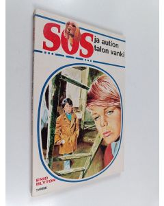 Kirjailijan Enid Blyton käytetty kirja SOS ja aution talon vanki