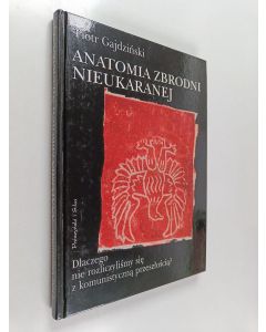 Kirjailijan Piotr Gajdziński käytetty kirja Anatomia zbrodni nieukaranej - dlaczego nie rozliczyliśmy się z komunistyczną przeszłością?