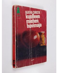 Kirjailijan Agatha Christie käytetty kirja Kuolleen miehen huvimaja