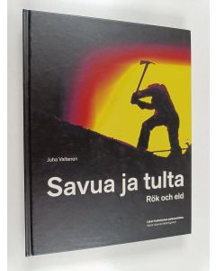 Kirjailijan Juha Valtanen käytetty kirja Savua ja tulta : Espoon pelastustoimi 1956-2004 = Rök och eld : Esbo räddningsväsen 1956-2004