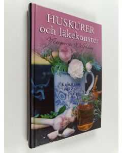 Kirjailijan Marguerite Walfridson käytetty kirja Huskurer och läkekonster : kloka råd från nu och då