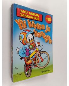 Kirjailijan Walt Disney käytetty kirja Yli kivien ja kantojen