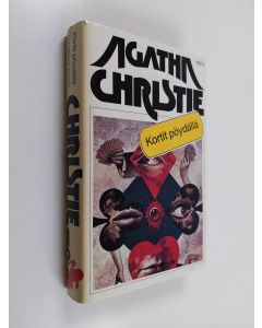 Kirjailijan Agatha Christie käytetty kirja Kortit pöydällä / Syyttävä sormi