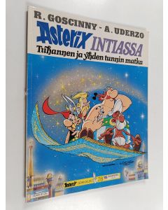 Kirjailijan Uderzo käytetty kirja Asterix Intiassa : tuhannen ja yhden tunnin matka