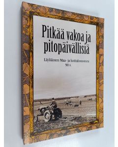 Kirjailijan Raimo Rajaoja käytetty kirja Pitkää vakoa ja pitopäivällisiä : Läyliäisten maa- ja kotitalousseura 90 vuotta
