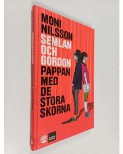 Kirjailijan Moni Nilsson käytetty kirja Pappan med de stora skorna