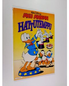 Kirjailijan Walt Disney käytetty kirja Aku Ankan hattutemppu