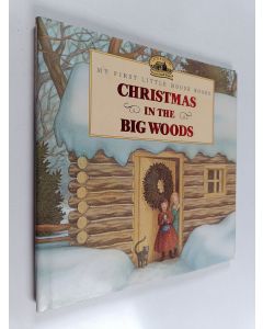 Kirjailijan Laura Ingalls Wilder käytetty kirja Christmas in the Big Woods