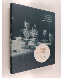 Kirjailijan Kirsti Grönholm & Kaisa Koivisto ym. käytetty kirja Pöytä koreaksi : Kattauksen ja pöytätapojen historia