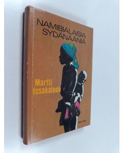 Kirjailijan Martti Issakainen käytetty kirja Namibialaisia sydänääniä : ennen kuin valtakunta syntyy