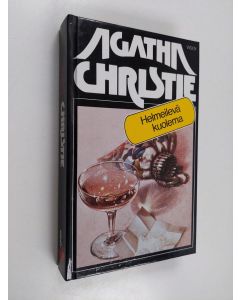 Kirjailijan Agatha Christie käytetty kirja Helmeilevä kuolema