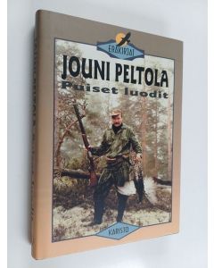 Kirjailijan Jouni Peltola käytetty kirja Puiset luodit : eräkertomuksia itärajalta Jäämerelle