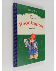 Kirjailijan Michael Bond käytetty kirja Paddington lähtee lomalle