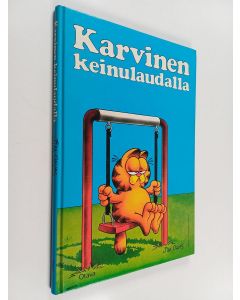 Kirjailijan Jim Davis käytetty kirja Karvinen keinulaudalla