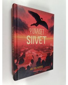Kirjailijan Anne Louise MacDonald käytetty kirja Punaiset siivet