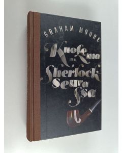 Kirjailijan Graham Moore käytetty kirja Kuolema Sherlock-seurassa