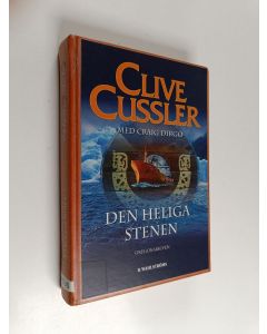 Kirjailijan Clive Cussler käytetty kirja Den heliga stenen