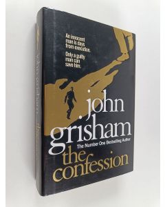 Kirjailijan John Grisham käytetty kirja The confession