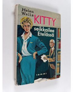 Kirjailijan Helen Wells käytetty kirja Kitty seikkailee Etelässä