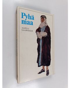 Kirjailijan Aapeli Saarisalo käytetty kirja Pyhä maa : raamatun muinaistutkimuksen valossa