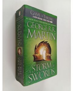 Kirjailijan George R. R. Martin käytetty kirja A storm of swords