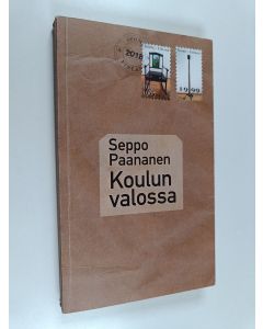 Kirjailijan Seppo Paananen käytetty kirja Koulun valossa : muistelmaromaani
