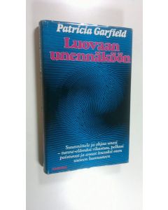 Kirjailijan Patricia L. Garfield käytetty kirja Luovaan unennäköön