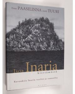 Kirjailijan Erno Paasilinna käytetty kirja Isoa Inaria kiertämässä : kuvauksia Inarin vesiltä ja rannoilta