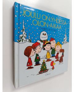 Kirjailijan Charles M. Schulz käytetty kirja Joulu on yhdessäolon aikaa