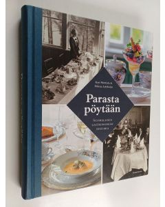 Kirjailijan Kari Martiala käytetty kirja Parasta pöytään : suomalaisen gastronomian historia