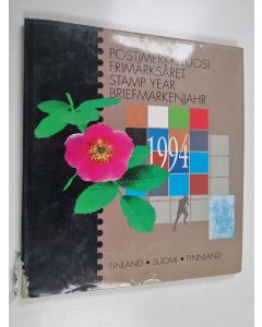Kirjailijan Juha Pärssinen käytetty kirja Postimerkkivuosi 1994 = Frimärksåret 1994 = Stamp Year 1994 = Briefmarkenjahr 1994 (postimerkit mukana)