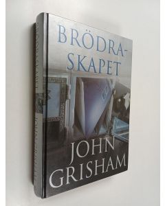 Kirjailijan John Grisham käytetty kirja Brödraskapet
