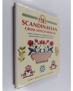 Kirjailijan Jana Hauschild Lindberg käytetty kirja Scandinavian cross stitch designs