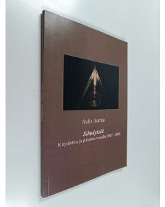 Kirjailijan Aulis Aarnio käytetty kirja Silmäyksiä : Kirjoitettua ja puhuttua vuosilta 2007-2009